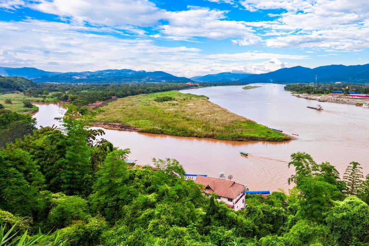 Immerse in Chiang Rai’s lush landscapes with rain gear